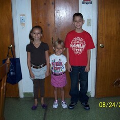 left-right...Lexi, Taelor, and Allin your brother and sisters on their first day of school