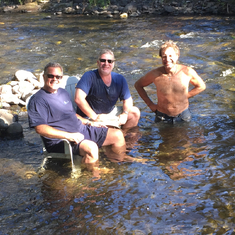 Kevin, Edward, and Neal cooling off in the creek.