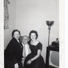 Jeanne and parents 1956