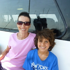 Jeannie with my son Noah, August 2011. She was part of our family always, and on this day she came with us on a fishing trip for his 9th birthday.
