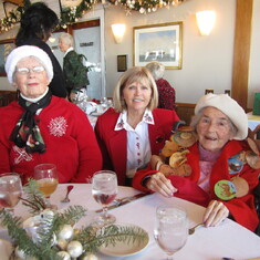 Dale Hoeffliger between Jean and mother Vivian at the Sage Hens Christmas luncheon at the SB Yacht C