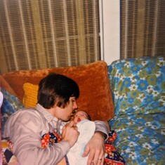 I am so grateful to find all these pictures of me as a new born, he loved being a father.