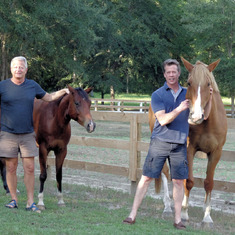 Jeff and Dave bringing horses