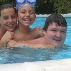Jeffrey, Jesse, and Little Laura enjoying the pool!!
