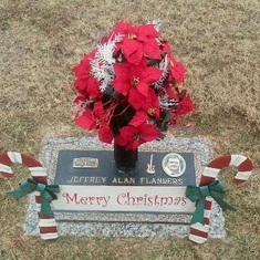 Nikki bought the beautiful flowers and Merry Christmas sign for Jeffrey!  Ricky, the best husband and father I could have ever been blessed with, goes to the cemetery about once a month to change Jeffrey's flowers and clean his marker.