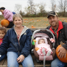 Haylie, Grammy, Poppy and Olivia at the pumpkin patch