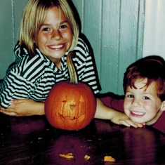 carving pumpkins with big sister