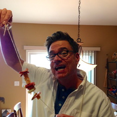 Making meat and cheese necklaces for a beer festival.  Jeffrey loved  the novelty of it and had to show everyone we met!