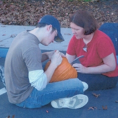Todd and Jennie getting their pumpkin ready