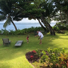 Jerry teaching grandson Michael to play ball (Kauai 2018).