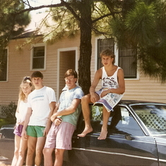 Jordan, Jeremy, Chris Accardo, and me. Taken July 1991, not sure by who. Leaning on Betsy, my Buick. Stories of adventures in Betsy are likely not appropriate for this website.