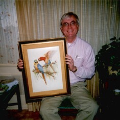 Dad with beautiful parrots painted by his mother