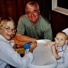 Mom and Dad feeding Shannon