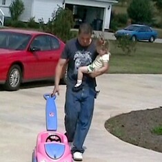She would rather daddy hold her than be pushed...lol