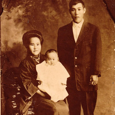Mother Karu Hara Kawasuna with baby Alice Kawasuna and father Takichi Kawasuna