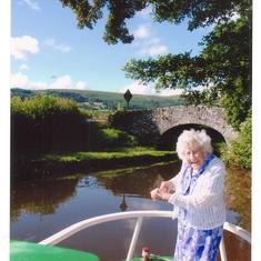 Nana driving the boat - look out!