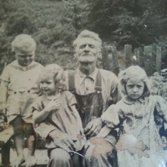 Charley Davenport (Father) , on his knee Jewel Goodin , to his left Kathleen Sturgill And the little man to his right was WD Davenport (Charley's Grandson)