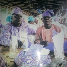 That's my bag on the table ,I wore a lovely Ankara purple gown on that wedding function