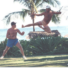 Nick and Jimbo kicking in Hawaii