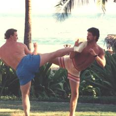 jimbo and nick kicking at the beach on maui