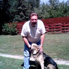 Jim & Buddy in the backyard 8-12-2001