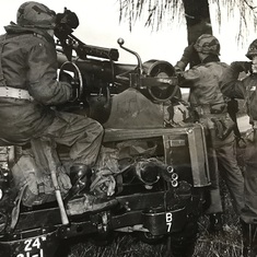 This is a photo of the106 recoiless rifle. Jim Engel is the gunner in this photo. The man in the middle is the squad leader, Sp. 4 Quillen. The man on the right is the 106 loader, Jon Leonard.