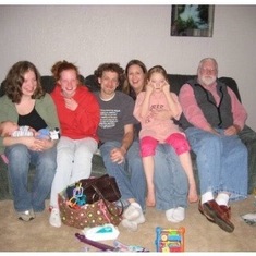 At Jane’s when Cameron was born. Jenni holding Cam, Terri, Josh, Heather, Alicia on lap and Bompa