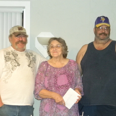 Left to Right:  Henry Utley (brother), Janie Shelly (mother), Big Jim Utley