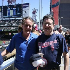 Jim and his brother Thom at a Twins game