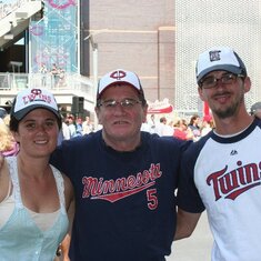 Jim with his niece Chelsea and nephew Dustin at a Twins game