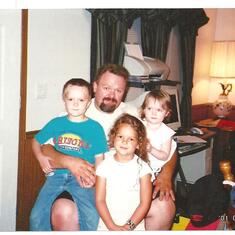 Dale, his brother Adrian and sister Emilee, and niece Kelsey