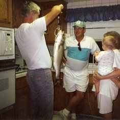showing his fish to neighbor Rob & Molly w/Ty