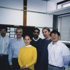 Jingqi and Fei with members of the Theoretical Physics group at the University of Hull. 