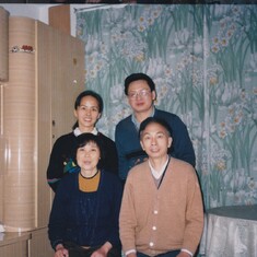 Jingqi and Fei with Jingqi's uncle (舅舅) and aunt. 