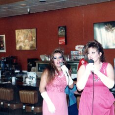 JoAnn and Rosie singing at our coffee shop
