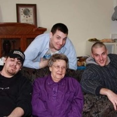 my grandmother with her 3 grandchildren. 