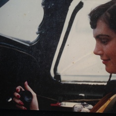 Mom on one of her first flying dates with Dad, notice she had her nails done.