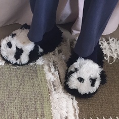 Joan in her favorite panda slippers.