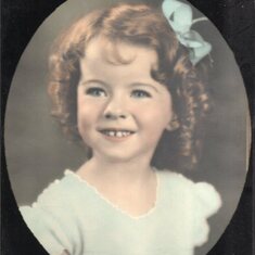 As a young girl, relatives thought she looked like Shirley Temple.