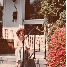 On the front porch of her first house in Vienna, VA