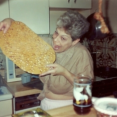 Mom loved to make holiday goodies. Getting ready to eat some peanut brittle.
