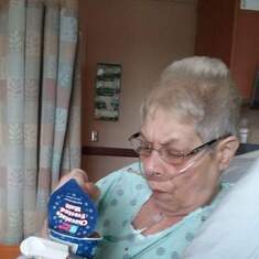 This picture was taken the day before moms heart attack after her surgery. I stopped off at moms favorite meat market and brought her a malted cup. Mom loved these cups. Mom ate that cup right up. I was so happy to bring her joy.