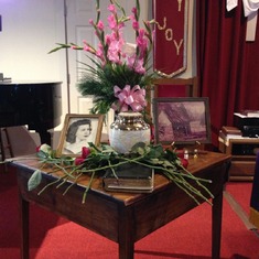 Joann's picture, her urn,  the old homestead, Silver & Gold, family rose tribute, her bible