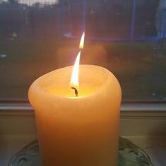 Jamie Jo lit a candle for Joann.