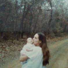 My mom and me 1982 I was 3 days old I miss the smell of he hair