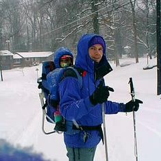 Cross-country skiing with baby Alison