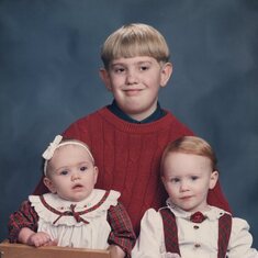 Feb. 1996 Joel with sisters Jenna and Jessica