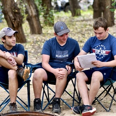 Helping Asher memorize his lines while camping.