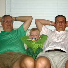 Joe, Jerald, and Aidan relaxing on the sofa