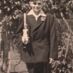 Dad’s First Communion. He bought the clothes he’s wearing with his money that he worked for.